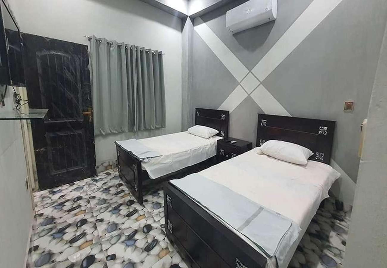 Al Qadir Residence Мултан Екстериор снимка