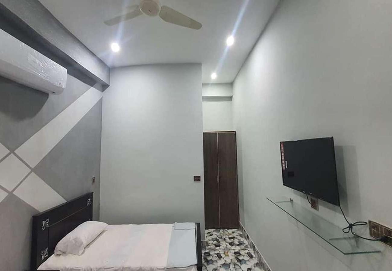Al Qadir Residence Мултан Екстериор снимка